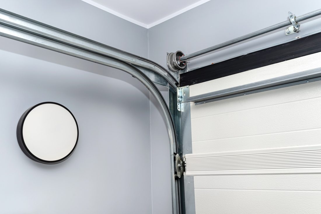 Modern residential garage door with frosted windows in Ontario home